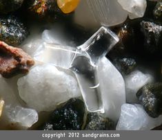 an assortment of rocks and ice cubes on top of each other