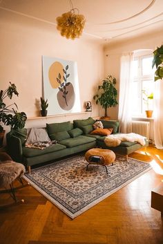 the living room is clean and ready for us to use it's natural light