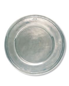 an empty silver plate on a white background