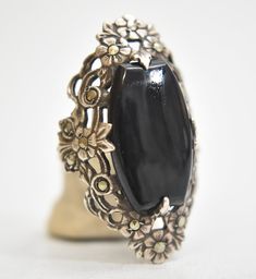 "Long onyx ring Art Deco Marcasites floral design sterling silver women **AS IS**Loose stone & Bent Band Not structural Size 4.25 Weight 6.2g Widest part of band 1 3/8\" Thinnest part of band 1/8\" Delivered in a Gift Box Free Shipping and Free Postal Insurance" Art Deco Sterling Silver Cabochon Jewelry, Vintage Onyx Gemstone Jewelry, Vintage Onyx Ring Jewelry, Victorian Sterling Silver Rings With Cabochon, Collectible Onyx Ring Jewelry, Handmade Vintage Onyx Rings, Ornate Cabochon Ring Jewelry, Feminine Tips, Cat Ring