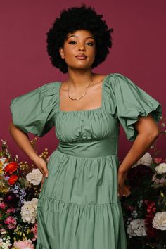 Baltic Born exclusive style! Dusty Green color Cotton material Comfortable relaxed fit Smocked back for a comfortable fit Darling square neckline Classic short puff sleeves with elastic cuffs Functional side pockets Tiered midi skirt Fully lined Self: 100% Cotton Lining: 100% Polyester Trina is 5'6, cup size 32D, size 2 and is wearing size S Sierra is 5’8, cup size 37”, size 6/8 and wearing size M Square Neck Puff Sleeve Dress For Brunch, Square Neck Puff Sleeve Dress With Elastic Sleeves, Puff Sleeve Dress With Gathered Neckline For Brunch, Puff Sleeve Dress With Square Neck For Brunch, Green Puff Sleeve Dress With Ruched Detail, Green Ruched Puff Sleeve Dress, Green Puff Sleeve Dress With Elastic Sleeves, Puff Sleeve Square Neck Dress For Brunch, Relaxed Fit Puff Sleeve Dress With Gathered Sleeves