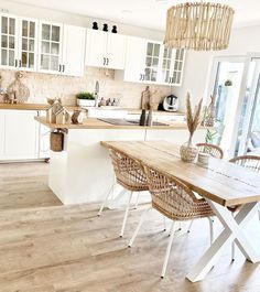 the kitchen is clean and ready to be used as a dining room or living room