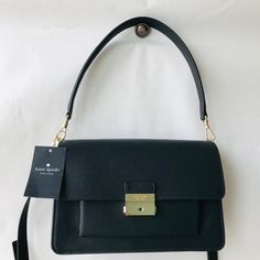 Kate Spade Voyage Small Grain Textured Shoulder / Crossbody Bag * Brand New! Grain Textured Leather * 3 Compartments Inside- 1 Zipper Compartment. * Small Pocket Underneath Flap. * Slip Pocket On Back * Measurements: 9.5”W X 6”H X 3.25”D Msrp : $358 Kate Spade Crossbody Shoulder Bag With Gold-tone Hardware, Kate Spade Rectangular Bags, Kate Spade Crossbody Shoulder Bag With Detachable Strap, Classic Kate Spade Shoulder Bag With Adjustable Strap, Kate Spade Crossbody Satchel For Work, Kate Spade Crossbody Bag With Adjustable Strap, Workwear Bags With Detachable Strap And Flap Shape, Workwear Flap Bag With Detachable Strap, Kate Spade Double Handle Shoulder Bag With Adjustable Strap