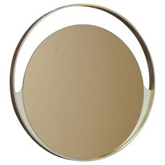 a round mirror on a white background