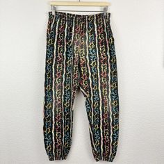 Vintage 80s Baggy Colorful Sportswear Muscle Bodybuilding Parachute Pants Size M | eBay Sporty Multicolor Bottoms With Relaxed Fit, Multicolor Relaxed Fit Athleisure Bottoms, Casual Multicolor Joggers With Elastic Waistband, Sporty Multicolor Bottoms With Elastic Waistband, Sporty Multicolor Relaxed Fit Bottoms, Athleisure Multicolor Bottoms With Elastic Waistband, Multicolor Athleisure Bottoms With Elastic Waistband, Multicolor Sweatpants For Spring Loungewear, Casual Multicolor Sweatpants For Spring