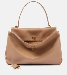 Rodeo Large leather tote bag in beige - Balenciaga | Mytheresa Luxury Beige Shoulder Bag With Turn-lock Closure, Beige Double Handle Bag With Turn-lock Closure, Beige Office Bag With Turn-lock Closure, High-end Satchel With Turn-lock Closure, High-end Bags With Turn-lock Closure For Everyday Use, High-end Top Handle Bag With Turn-lock Closure, Chic Top Handle Bag With Turn-lock Closure, Designer Top Handle Bag With Turn-lock Closure, Beige Calf Leather Bags For Work