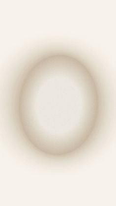 a white circular object is shown in the middle of an image with no light on it