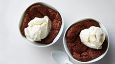 two white bowls filled with brownie and ice cream