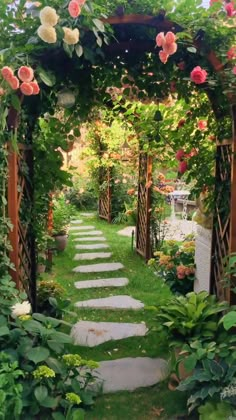 a garden path with stepping stones and flowers on either side, surrounded by greenery