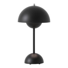 a black table lamp on a white background