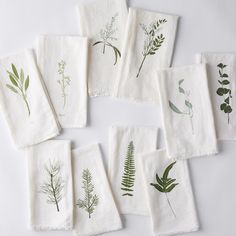 six tea towels with different types of plants printed on them