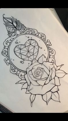 a drawing of a rose with a diamond in the middle