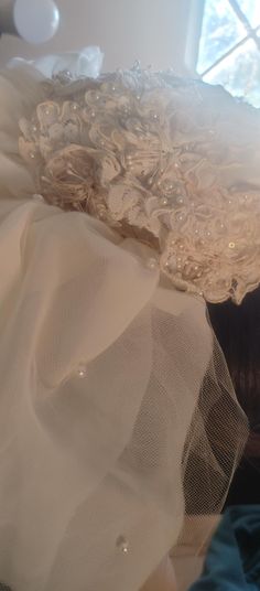 Ivory designer bridal hat.  good condition.   Aloncon lace on hat.  hat is of organza and short lively veil has several typds of fabric and lace.   all in good condition. no refunds Elegant Lace Veil For Ceremony, Wedding Bonnet With Lace Trim, Cream Tulle Wedding Veil, Elegant Lace Trim Veil For Ceremony, Elegant Lace Work Veil For Ceremony, Cream Lace Bridal Accessories For Party, Elegant Wedding Bonnet, Elegant Cream Wedding Bonnet, Lace Wedding Hat