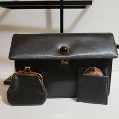 Vintage Koret Black Calf Skin Leather Feel And Looks Like Silk. Black Cabochon Snap Closure. Comes With The Original Chain Attached Coin Purse And Original Mirror In Pouch. In Amazing Condition. Has A Few Minor Scuffs From Storage. Looks Like It Was Never Used. Please See Pictures For Description And Condition Measures Approx: 5" X 1.5" X 8" Luxury Vintage Clutch Coin Purse, Chic Vintage Black Bag For Formal Occasions, Chic Vintage Black Formal Bags, Black Office Clutch With Magnetic Closure, Timeless Black Business Clutch, Classic Black Clutch For Office, Timeless Black Clutch For Office, Timeless Black Office Clutch, Elegant Vintage Black Bag For Formal Occasions