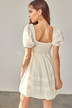 Final Sale - Get it before it's gone! You'll look as sweet as can be in the Josephine White Ruched Puff Sleeve Mini Dress! Woven fabric shapes this dress that has puff sleeve with ruffle trim, a sweetheart neckline, and a ruched bodice. A fitted waist tops an A-line mini skirt with tiers of ribbons. Smocked back for a perfect fit! Lined. DETAILS & CARE 65% Cotton/ 35% Polyester. Rayon lining. Machine wash cold. Imported. Cottagecore Puff Sleeve Dress With Square Neck And Ruffles, Cute Square Neck Dress With Gathered Sleeves, Flirty Puff Sleeve Dress With Smocked Back, Cute Puff Sleeve Dress With Smocked Bodice, Cute Mini Puff Sleeve Dress With Gathered Sleeves, Cute Puff Sleeve Dress With Ruffles And Square Neck, Cute Dresses With Gathered Sleeves For Brunch, Cute Puff Sleeve Dress With Gathered Sleeves For Brunch, Cute Fitted Puff Sleeve Dress With Ruffle Hem