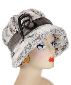 THE GRACE, handmade in Seattle, WA, USA, is a soft and flexible, 1920s style cloche hat. This hat is shown in Khaki Luxury Faux Fur with a 1 1/2" Midori Velvet band in Pewter and assorted trims. The brim is 2" at center front, flaring out to 2 3/4" at side front, and curving back to 3/4" at center back of hat. The crown is made of six panels. Prices are as shown. These pieces are made-to-order and may be exchanged or returned for a store credit only. All sales of items with customizations or alt Winter Gatsby Fitted Hat, Winter Fur Felt Cloche Hat With Short Brim, Winter Fur Felt Brimmed Cloche Hat, Winter Brimmed Fur Felt Cloche Hat, Winter Gatsby Style Fitted Cloche Hat, Fur Felt Cloche Hat For Winter, Winter Brimmed Cloche Hat In Fur Felt, Brimmed Fur Felt Cloche Hat For Winter, Fitted Flapper Cloche Hat With Brim