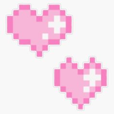 two pink pixel heart stickers sitting next to each other