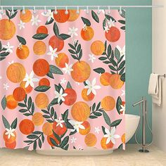 an orange shower curtain with flowers and leaves on it