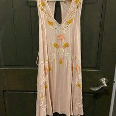 Blush Pink Dress From Free People Intimately. Tank Top Design. V-Neckline. Embroidered Eyelet Detailing. Lace Up Sides On The Back With Tasseled Ends. Button Loop Back Closure With Keyhole. Shift Dress. Mini Style/Above The Knee Length. Boho Style. Relaxed, Flowy, Comfortable Fit. Made Of 100% Rayon. New With Tags Size Xsmall Length- 34in Pit To Pit- 16.5in Boho, Bohemian, Summer, Floral, Design, Resort, Beach, Summer, Spring, Vacation, Cruise, Trip, Tropical, Bohemian Pink Sleeveless Floral Embroidered Mini Dress, Pink Sleeveless Mini Dress With Floral Embroidery, Pink Floral Embroidered Sleeveless Mini Dress, Pink Floral Embroidery Sleeveless Mini Dress, Pink V-neck Mini Dress With Floral Embroidery, Pink Bohemian V-neck Mini Dress, Peach Dresses With Floral Embroidery, Pink Floral Embroidered V-neck Mini Dress, Pink Floral Embroidery V-neck Mini Dress