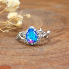 AAA Ethiopian opal ring for women, Handmade opal ring, Handcrafted opal ring, Spiritual opal ring, ring for her, Natural fire opal ring, Genuine fire opal jewelry, Gift for her. *Other Similar Jewelry Available Here* https://www.etsy.com/shop/AreebaJewelry Details:- Gemstone - Ethiopian opal  Stone Color - Natural Blue  Stone Setting - Prong Quality - AAA Grade Ring Size - 4 US TO 9 US Available Type - 100% Natural  Shipping service - Free worldwide shipping service About AreebaJewelry:- AreebaJewelry takes great pride in the design and craftsmanship of our fine jewelry pieces. We use only the finest materials and the highest manufacturing standards. We strive to make sure every jewelry piece we design is perfect. ♥️ Blue opal ring, fire opal ring, blue opal jewelry, fire opal jewelry, Min Pear Opal Ring, Blue Opal Jewelry, Fire Opals Jewelry, Blue Opal Ring, Opal Wedding Rings, Ethiopian Opal Ring, Fire Opal Ring, Minimalist Rings, Rings For Her