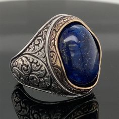 Men Handmade Ring , Natural Lapis Lazuli Stone Ring , Blue Lapis Stone Ring , Ottoman Style Ring , 925k Sterling Silver Ring , Gift For Him ★Item Details * Gender : Male / Female * Material : 925K Sterling Silver * Total weight : 19 Grams * Gemstone : Lapis Lazuli Stone ✔ Ready to Ship in 1-2 Business Days .. ✔ Shipped to the Worldwide 1-5 business days with free shipping... ✔ The product will be sent to you with a handmade wooden box to avoid any damage during shipping... ✔ Visit our store, bro Oval Blue Engraved Ring, Blue Engraved Signet Ring As Gift, Classic Handmade Blue Ring, Unique Blue Engraved Ring, Engraved Blue Sapphire Ring, Classic Handmade Blue Rings, Engraved Blue Signet Ring As Gift, Blue Engraved Ring With Polished Finish, Handmade Classic Blue Signet Ring