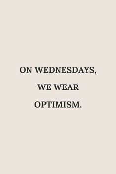 the words on wednesdays, we wear optimism are in black and white