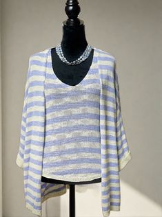 The perfect finishing touch to your effortless summer look, this striped cardigan adds a layer of cozy comfort whenever you need it. Crafted from the same lightweight cotton blend as the matching tank top, it features a relaxed fit throughout with loose, wide sleeves that offer a slouchy silhouette. Looking for a snugger fit? No problem! This cardigan is generously sized, so you may want to consider sizing down for a cozier feel. Pair it with the matching Striped Knit Tank Top (sold separately) Striped Cardigan, Cozy Fits, Blue Ivory, Wide Sleeves, Knitted Tank Top, Knit Tanks, Striped Knit, Comforters Cozy, Snug Fit