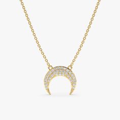 This enchanting necklace features a crescent moon pendant, meticulously crafted from 14k yellow gold (or rose or white gold). The curved silhouette is adorned with sparkling diamonds, creating a dazzling display of light and shadow. The pendant hangs from a delicate chain, making this necklace a perfect everyday piece that adds a touch of celestial flair to any outfit. - Handmade - Solid Gold - Natural Diamonds  - G Color, SI Quality Diamonds - Total Diamond Carat Weight: 0.12 ctw - Dimensions of Horn: 10 x 11 mm 🛠 Your Sarah Elise piece is handcrafted with care! Ready-to-ship items go out within 3 business days. Made-to-order pieces typically take 7-10 business days to create. If you need something sooner, please contact us - we'll see if we can make it happen! For estimated shipping dat Luxury White Gold Crescent Necklace, Luxury Crescent White Gold Necklace, Luxury Sterling Silver Crescent Necklace, Luxury Yellow Gold Crescent Necklace, Elegant Necklace With Moon Charm In Half Moon Shape, Fine Jewelry Crescent White Gold Necklace, White Gold Crescent Necklace In Fine Jewelry Style, White Gold Crescent Necklace Fine Jewelry, Luxury White Gold Necklace With Moon Charm