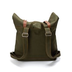 "Designed for both men and women, this waterproof edition of the unisex 105 features an expandable roll-top secured by genuine leather straps. Works best as a laptop bag, travel backpack, work satchel, school rucksack, or diaper bag. A minimalist urban style that can fit up to 15\" laptop, tablet, and documents, No. 105 is comfortable to touch, strong, and durable. ~ Capable of fitting everything you need for an overnight stay or daycation with its expandable top ~ ►WHAT MAKES THE WAXED EDITION/ Cheap Travel Backpack Canvas Bag, Cheap Canvas Satchel Backpack, Cheap Retro Green Backpack, Cheap Khaki Canvas Backpack, Luxury Waxed Finish School Backpack, Cheap Green Backpack With Adjustable Straps, Cheap Khaki Backpack With Adjustable Strap, Cheap Green Backpack For Adventure, Affordable Green Travel Backpack