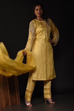 Mud yellow floral garden embroidered kurta with beads and sequin. Paired with coordinating organza panel pant and an organza dupatta. - Aza Fashions Yellow Salwar Kameez With Intricate Embroidery, Elegant Yellow Salwar Kameez With Intricate Embroidery, Yellow Silk Salwar Kameez With Intricate Embroidery, Yellow Silk Traditional Wear With Intricate Embroidery, Elegant Yellow Salwar Kameez With Dabka Work, Elegant Yellow Salwar Kameez With Resham Embroidery, Yellow Churidar With Intricate Embroidery For Festivals, Yellow Unstitched Suit With Intricate Embroidery For Wedding, Festival Yellow Churidar With Intricate Embroidery