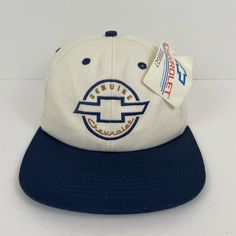 Vintage Genuine Chevrolet Deadstock Snapback K Products Hat. Item Condition: New With Tags, Deadstock. Item Comes From A Smoke And Pet Free Environment. Please Consider Pictures As Part Of The Description And Ask Any Questions Prior To Purchasing. Vintage White Baseball Cap With Curved Brim, Vintage White Flat Brim Hat, White Vintage Snapback Hat, Vintage White Cotton Trucker Hat, Vintage White Baseball Cap, Retro White Visor Hat, Vintage White Cotton Snapback Hat, Retro White Baseball Cap One Size Fits Most, Vintage White Hat, One Size Fits Most