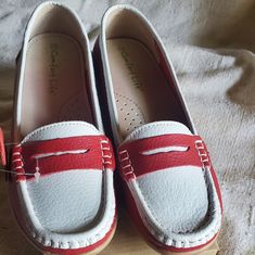 Comfort Life Leather Red And White Loafers. They Are Supposed To Be A Sz 10 But I Believe They Are A 9.5. Leather Upper, Cushioned Support Insole, Rubber Bottom. Red Round Toe Slip-ons For Spring, White Round Toe Boat Shoes With Rubber Sole, White Boat Shoes With Rubber Sole And Round Toe, White Boat Shoes With Rubber Sole, Red Slip-on Moccasins For Spring, Red Low-top Loafers For Spring, Casual Red Slip-on Moccasins, Red Closed Toe Casual Loafers, Casual Red Round Toe Slip-ons