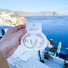 These White Beaded Raffia Hoops are perfect for adding a touch of elegance to any outfit. Their lightweight design ensures comfortable wear for all-day use. Crafted with precision, these earrings are a must-have for any fashion-forward individual. 2” Lead and nickel free. White Beads, Be Perfect, Fashion Forward, White, Design