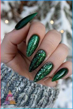 Exude elegance with these emerald green nail designs that shimmer with luxurious sparkles and snowflake-like patterns, reminiscent of a winter wonderland. Perfect for seasonal transitions and a touch of sophistication. Glide into a world of beauty at NailHow.com. Christmas Nails Green And Silver, Nails Green And Silver, Hunter Green Nails Design, Green Christmas Nails Holidays, Green Xmas Nails, Hunter Green Nails, Emerald Green Nail Designs, Green Christmas Nail Ideas, Emerald Green Nail