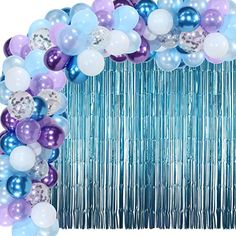 a blue and purple balloon arch with white, silver, and lavender balloons on it