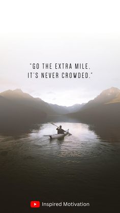 a person in a boat on the water with mountains in the background and a quote written above it