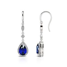 Polished metal and sparkling stones come together to create this unique jewelry, giving it a sophisticated and sparkling look. Made from sterling silver, these earrings make a stunning fashion accessory.Carat Weight: 2.77 ctStone Size: 6*9 mmStone Type: Jeulia® StoneNumber of Stones: 2 Stone Shape: PearStone Color: Sapphire BlueCarat Weight: 0.552 ctStone Size: 1.2,1,0.8 mmStone Type: Jeulia® StoneNumber of Stones: 56 Stone Shape: RoundStone Color: Diamond WhiteWeight: 2.95 gWidth: 8.8 mmHeight: Sapphire Dangle Crystal Earrings For Formal Occasions, Sapphire Crystal Dangle Earrings For Formal Occasions, Sapphire Crystal Dangle Earrings For Formal Events, Formal Sterling Silver Bridal Earrings With Pear Shape, Sterling Silver Teardrop Earrings With Sparkling Stones For Party, Silver Pear-shaped Diamond Earrings For Formal Events, Pear-shaped Sterling Silver Bridal Earrings For Formal Events, Pear-shaped Sterling Silver Bridal Earrings For Formal Occasions, Elegant Sapphire Crystal Dangle Earrings