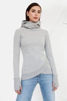 Meet the Geneva Sweatshirt, one of our all-time best sellers. She transforms a go-to staple perfectly ideal for your everyday wear into a formidable fashion statement. Geneva's cooled up with a structured, oversized hood, a tulip hem and thumbhole sleeves. She's crafted from a midweight European cotton mix sweatshirt fabric that's soft to the touch but highly breathable, helping you avoid ever becoming overheated.[SPLIT] Julia, in melange grey, is 5’10” (178 cm), wearing size XS. Christina, in d Fitted Hoodie, Sweatshirt Fabric, Extra Long Sleeves, Workout Hoodie, Grey Women, Geneva, Long Sleeve Sweatshirts, Hoodie Sweatshirt, Extra Long