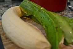 a close up of a banana on a cutting board