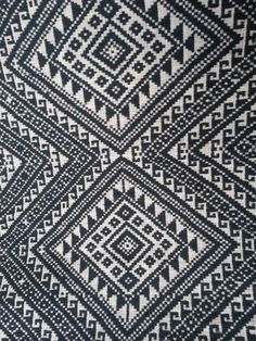 a black and white pattern on fabric