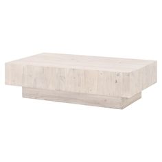 a white wooden table sitting on top of a white floor