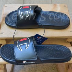 Champion Unisex Slide-Black Brand New . Embossed "C" Logo Adjustable Hook And Loop Closure Open Toe Lightweight Slide Sandal Made In China Contents: 100% Pu Black Slides For Training In Summer, Black Slides For Summer Training, Black Slides With Cushioned Footbed For Training, Black Casual Slides For Training, Casual Black Slides For Training, Mens Slides Sandals, Champion Slides, Mens Slide Sandals, Champion Shoes