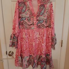 Nwot Paisley Dress In Pink With Small Flowers. Size Is A Large And Is 100% Polyester. Light Weight Material Great For Those Summer Days. Would Also Make A Great Coverup For You Swimsuit. Spring Patterned Dresses With Ruffle Hem, Patterned Spring Dresses With Ruffle Hem, Patterned Dress With Ruffle Hem For Spring, Casual Paisley Print Spring Dresses, Casual Paisley Print Dresses For Spring, Long Sleeve Midi Dress With Paisley Print For Spring, Pink Paisley Print Dress For Spring, Long Sleeve Paisley Print Midi Dress For Spring, Flowy Patterned Mini Dress