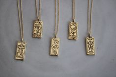 Gold plated Tarot Card charms on a 18k gold plated chain. *Available lengths: 16, 18, 20 inches Mystical Engraved Gold Necklace, Mystical Gold Engraved Necklace, Magical Gold Nickel-free Jewelry, Mystical Engraved Gold Jewelry, Mystical Gold Charm Necklace Gift, Tarot Card Necklace, Heart Moon, Card Necklace, Moon Stars