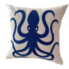 an octopus pillow on a white background