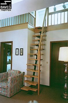 an image of a living room with stairs