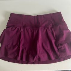 Great Condition! Never Been Worn Athletic Mini Skirt From Athleta Size S First Ys 4-6 Sports Mini Skirt With Built-in Shorts, Purple Skort With Built-in Shorts, High Waist Stretch Mini Skirt For Sports, Sports Mini Skort With Elastic Waistband, Sports Skort With Elastic Waistband, Mini Skort For Sports With Elastic Waistband, Mini Skort With Elastic Waistband For Sports, Sporty Skirt With Wide Waistband For Sports, Solid Color Workout Skirt With Elastic Waistband