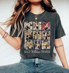 a woman with long hair wearing a disney world t - shirt