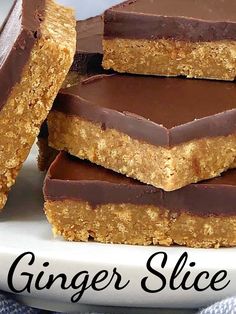 a white plate topped with chocolate and peanut butter bars