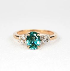 This beautiful ring comes with a center oval shape 1.5ct lab-grown Mint Green Sapphire and 6 round-shape diamonds and 4 marquise shape Diamonds. Available in yellow gold, rose gold, white gold or platinum.It is a perfect choice for those who are looking for a dainty engagement ring in 9k/14k/18k Yellow, Rose or White Gold.It is also a great gift for Christmas, Valentine's day, birthday, anniversary or for celebration for any special occasion.✯✯ Free UK and USA shipping ✯✯✯ ✯ No Custom Charges fo Oval Green Cluster Ring For Wedding, Oval Emerald Wedding Ring With Center Stone, Oval Emerald Rose Gold Ring For Wedding, Oval Rose Gold Emerald Ring For Wedding, Oval Emerald Wedding Rings, Fantasy Wedding Rings, Diamond Ring Oval, White Gold Sapphire Ring, Dainty Engagement